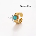 Gouden roestvrijstalen open ring met turkoois inleg en gehamerde textuur afwerking - TR089-Blauw Ronde Steen