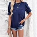 Navy short sleeve top with textured eyelet embroidery and stylish ruffled puff sleeves - Navy Blue