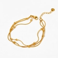 Detail view of gold PVD plated double-layer snake chain bracelet with round beads - Double Layer Snake Bead Style (HandK082)