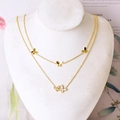 Elegant gold double layer butterfly necklace with white shell heart pendant design - Butterfly