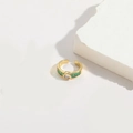 Gold adjustable ring with green emerald-cut zircon and clear center stone - Square Green Zirconia