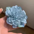 Blue fabric floral hair clip with layered mesh petals held in hand for hair decoration - Blue Peony