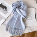 Light blue 100% Australian wool scarf with fringe on white marble background - Sky Blue