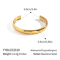 Golden open bangle in stainless steel with relief patterns and small diamonds - Star Eye Relief (YYBL023010)