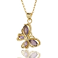Detail of a gold-plated butterfly pendant featuring sparkling purple gemstones with reflection - Purple