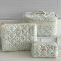 Three-piece quilted cotton cosmetic bag set featuring green floral patterns for travel - Spring Fresh Green Floral Corduroy