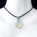 Heart-shaped opal crystal pendant necklace with blue sheen on a black cord strap - Opal (Synthetic)