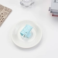 Retro light blue and white checkered pattern medium hair claw clip in a glossy resin finish - Aquamarine