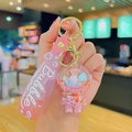 Llavero de astronauta rosa con arena movediza líquida y correa de goma suave flexible - Astronauta de Arena Movediza Rosa