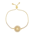Bracciale a croce dorata regolabile con pendente rotondo traforato e zirconi brillanti - Croce / Oro