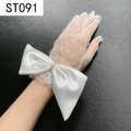 Close-up of white lace bridal gloves with large satin bow and pearl detail at wrist - White Lace Satin Large Bowknot Pearl (ST091)