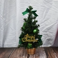 Mini green Christmas tree with green ribbons and baubles in a golden basket - 30cm / Green