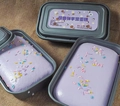 Squishy slow rebound taro purple cake toy in three grey boxes with colorful sprinkles - Taro Cake Box