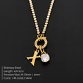 Gold stainless steel necklace with 'X' initial and sparkling rhinestone pendant - Letter X (XNL0103)