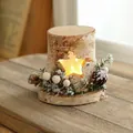 Star-shaped wooden LED lantern with natural bark texture and winter pine decorations - Pine Cone Battery Style