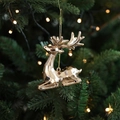 Addobbo natalizio a forma di renna dorata a specchio appeso a un albero illuminato - Stile Alce