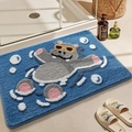 Blue bath mat with swimming hippo design, made of soft absorbent flocked material - 40*60cm / Cozy Hippo (Blue)
