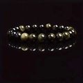 Elastic beaded bracelet with polished black obsidian and golden tiger eye gemstones - Gold Obsidian