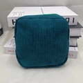 Dark cyan corduroy cosmetic bag with vertical texture and matching zipper closure - Malachite green