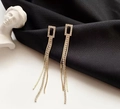 Elegant gold tassel earrings with rhinestones on a black silk background - Rectangular Frame Full Rhinestone Tassel (E1743)