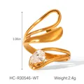 Detailed view of gold-plated geometric ring with pear-shaped zircon and leaf-like curves - Wrapped Leaf Pear Clear Zirconia (HC-R30546-WT)