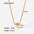 Close-up of golden box chain necklace with a 1.2cm polished sphere pendant for women - Gold (JDN21055)