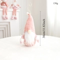 Detail of pink Christmas gnome plush showing 30cm height and 150g weight specifications - Pink Standing Gnome Santa / Height 30cm/Weight 150g