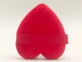 Red heart-shaped powder puff with satin ribbon handle for makeup application - Red