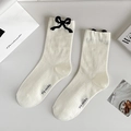 Chaussettes mi-mollet blanc crème avec nœud noir et inscription Fly socks pour femmes - Taille unique / Grand Nœud Blanc