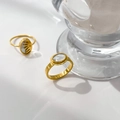 Detail showing golden rings with mother of pearl inlay and sunburst design - US 6 / Small Oval