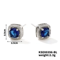 Detail view of 0.9cm square blue zircon stud earrings with silver pavé diamond halo - Silver-Royal Blue Zircon