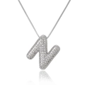 Detailed macro view of silver cubic zirconia paved capital letter N hip hop pendant - Letter N