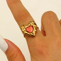 Irregular textured golden heart ring with a vibrant red enamel inlay on finger - 18K Gold Plated Red Lava Heart (11939)