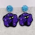 Detail of acrylic cat earrings with purple galaxy patterns and blue glitter accents - JE1011K (Black Cat Starry Sky)