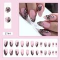 Macro view of pink almond press-on nails with black glitter butterfly motifs and 24 pieces - Z744 Black Butterfly