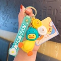 Porte-clés canard jaune avec chapeau dinosaure vert et lanière bleue WHY DUCK pour sac - Vert