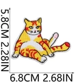 Detail showing dimensions of an orange cat embroidery patch on a white background - Sitting Striped Orange Cat Style