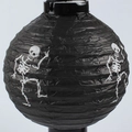 Foldable black paper Halloween lantern featuring a white skeletal bone pattern design - Black Skull Glowing Lantern