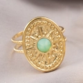 Vintage gold titanium steel ring with oval light green stone and sunburst pattern - Green Zircon