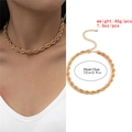 Statement layered gold aluminum chain necklace with adjustable extender shown on model - Gold Matte Twisted Rope Chain