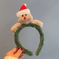 Christmas headband with a green plush band and a festive small monkey in a red Santa hat - Gingerbread Man Headband