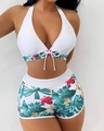 Detail of tropical floral print on high-waisted bikini bottoms and halter top set - S / Multi-color 2