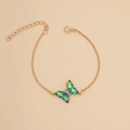 Detail of gold butterfly bracelet with green and blue gradient faceted crystal wings - 11# Bracelet Green