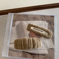 Close-up of two brown plush hair clips set on a vintage CD case and book background - Coffee (2Pcs/Set)