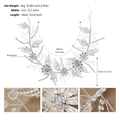 Dettaglio della fascia da sposa argentata con strass, perle di cristallo e foglie di fiori metallici - Argento
