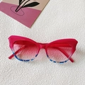 Occhiali da sole cat-eye con montatura sfumata rosso-blu e lenti rosa sfumate - Occhio di Gatto Sfumato Rosso Blu / Rosso Rodocrosite