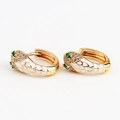 Gold snake earrings with white enamel coating and micro-set cubic zirconia accents - White