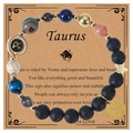 Detail of Taurus zodiac bracelet with natural volcanic stones and constellation charms - Taurus
