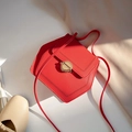 Elegant red litchi texture irregular shoulder bag with gold rotary buckle for women - Red