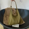 Avocado green hobo bag with adjustable strap and decorative stitching in large capacity - Green
